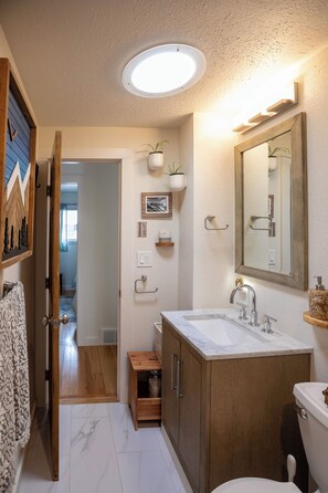 Eco-friendly toiletries, hair dryer, towels, soap