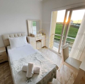 Deluxe Triple Room | Minibar, desk, laptop workspace, wheelchair access