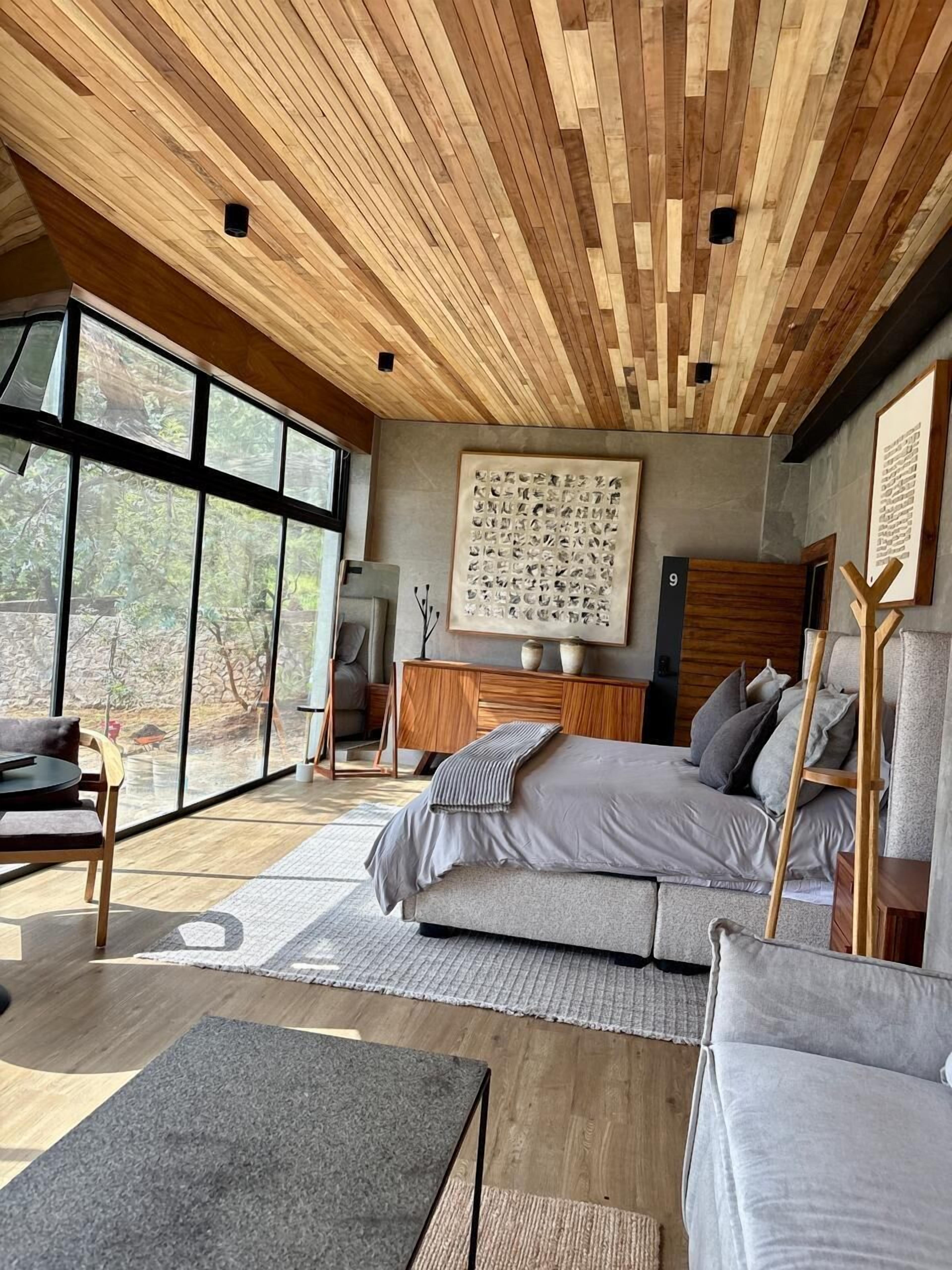 Honeymoon Room | Living area | 75-inch Smart TV with cable channels