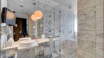 Jetted tub, hair dryer, towels, soap