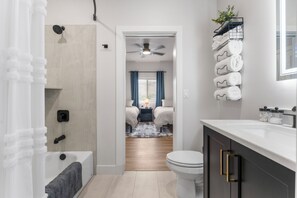 Shower, eco-friendly toiletries, hair dryer, towels