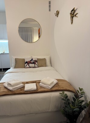 1 habitación, tabla de planchar con plancha, wifi y ropa de cama 