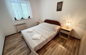 2 habitaciones, tabla de planchar con plancha y wifi gratis