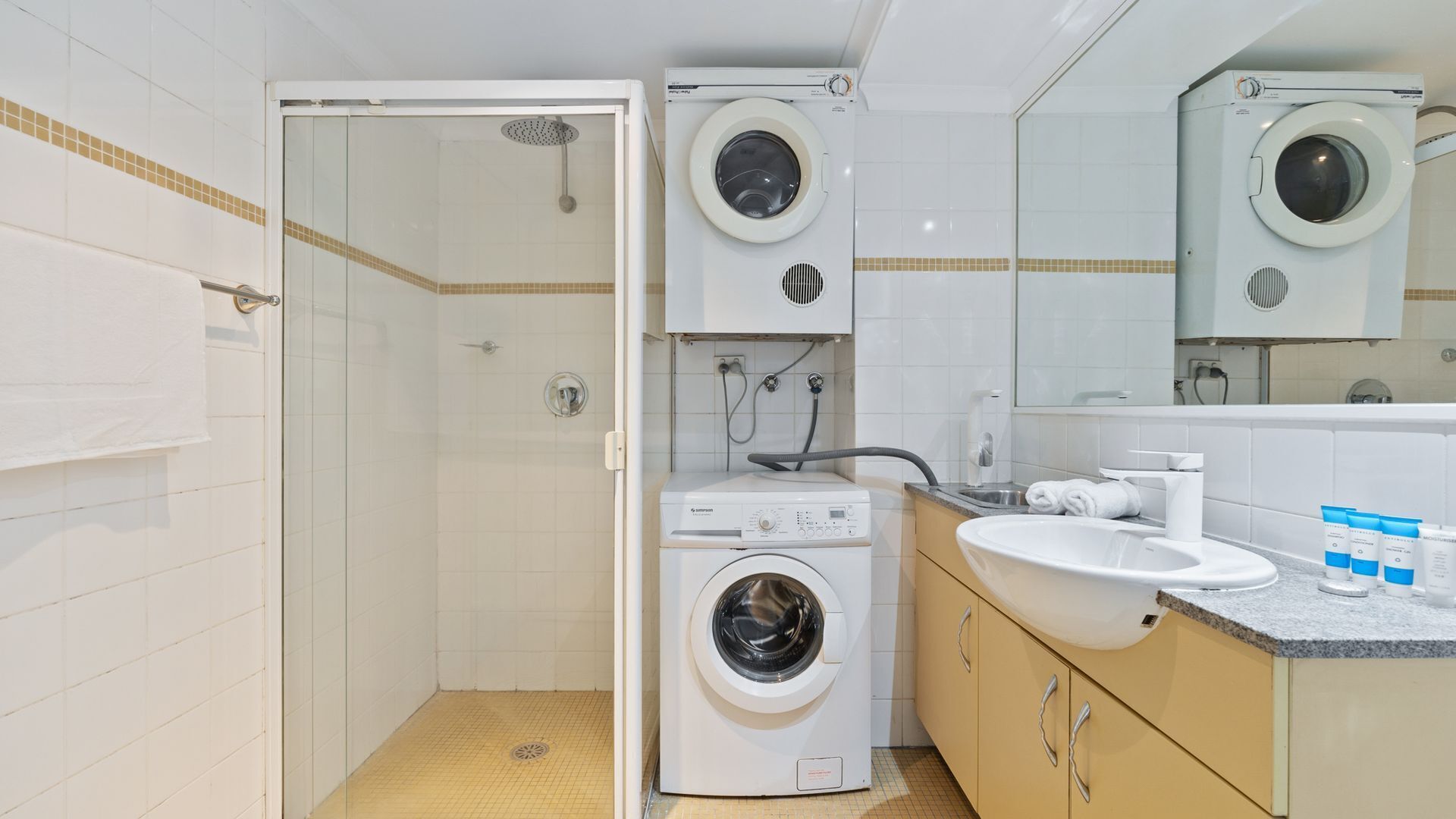 Shower, hair dryer, towels