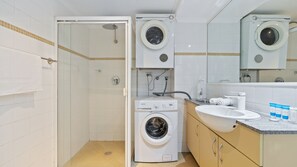 Shower, hair dryer, towels