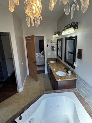 Jetted bath, hair dryer, towels, soap