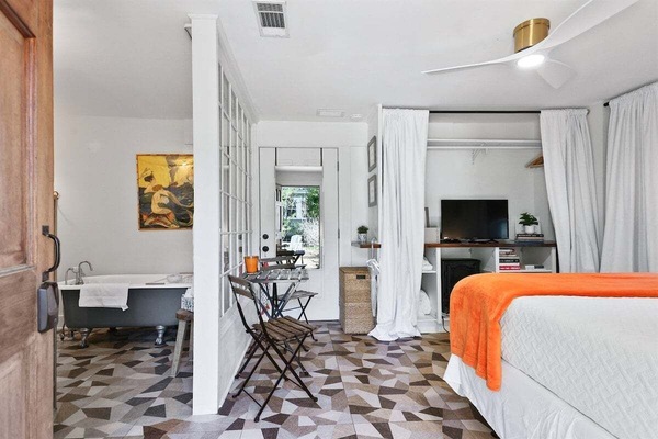 Experience the warmth and charm of our thoughtfully designed studio, where every detail creates a cozy haven for relaxation.