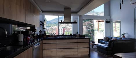 Fridge, coffee/tea maker, cookware/dishes/utensils