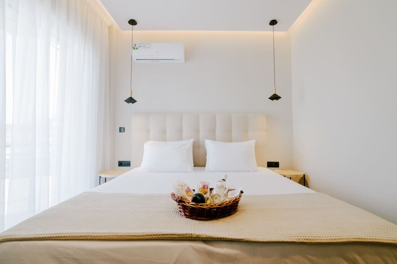 Tabla de planchar con plancha, wifi gratis y ropa de cama 