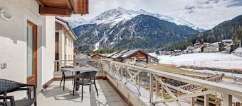 Appartement "Genziana" avec vue sur les montagnes, terrasse privée et Wi-Fi