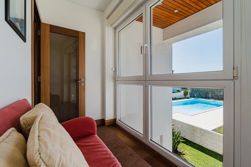 Holiday Home 'Viana Beach Surf House' with Sea View, Private Pool and Wi-Fi