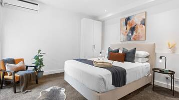 2 bedrooms, desk, iron/ironing board, travel crib