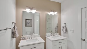 Shower, hair dryer, towels, toilet paper