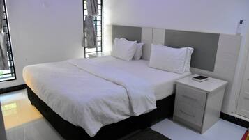 Deluxe Double Room, Garden View | Desk, laptop workspace, free WiFi