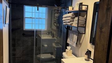 Shower, hair dryer, towels, soap