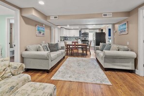 TV - Escape to Rising Tide: 8-bedroom beach retreat with private pool, hot tub, and modern amenities! (North Myrtle Beach)
