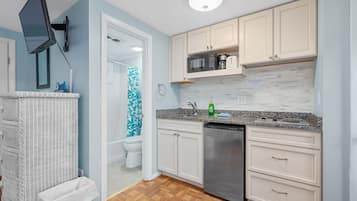Fridge, stovetop, toaster, cookware/dishes/utensils