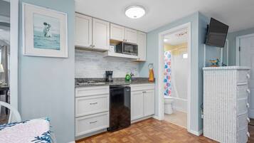 Fridge, microwave, stovetop, coffee/tea maker