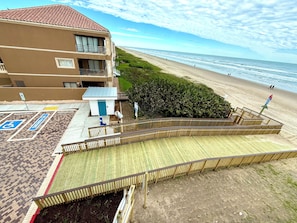On the beach, sun loungers, beach towels