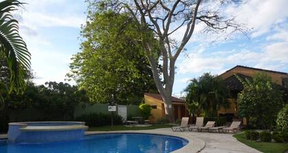 "Cozy 3-Bedroom Retreat – A/C, WiFi, Near Beaches & Shops, 15 Min to Airport!"