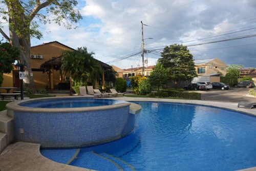 "Cozy 3-Bedroom Retreat – A/C, WiFi, Near Beaches & Shops, 15 Min to Airport!"