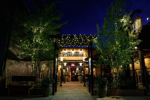 A restaurant named 'Warbon County Steakhouse' with outdoor seating and string lights. - Ski Run View Red Lodge (Red Lodge)