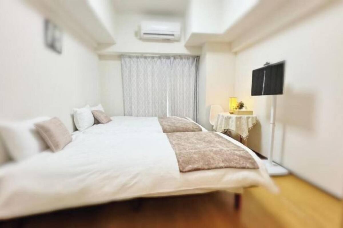 Premium bedding, down duvets, laptop workspace, blackout curtains