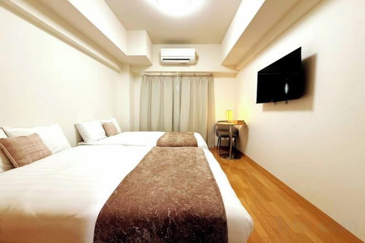 Premium bedding, down comforters, laptop workspace, blackout drapes