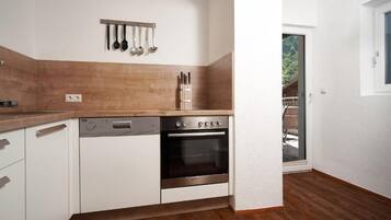 Basic Apartment, Mountain View | Private kitchen | High chair