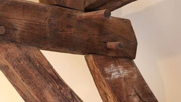 A wooden structure with intersecting beams.