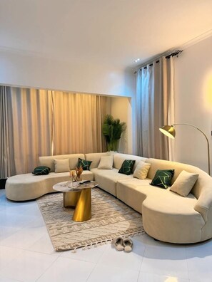 Luxury Apartment, City View | Living area | TV - Ace Homes Kampala (Kampala)