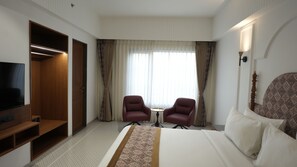 Deluxe Room | Premium bedding, memory foam beds, minibar, in-room safe - HALDI KUMKUM RESORT (Kamrej)