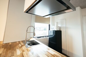 Chambre Familiale | Cuisine privée | Micro-ondes dans l'espace commun