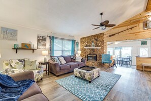 TV, fireplace, books