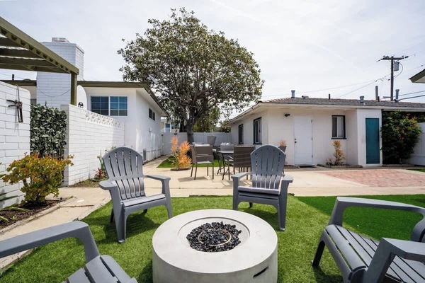 Enjoy the fire pit while sipping on a glass of wine on a cool night!