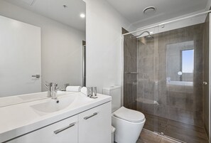 Shower, hair dryer, towels