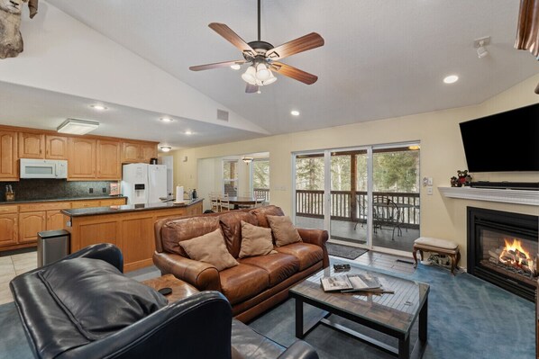 Smart TV, fireplace, table football, books