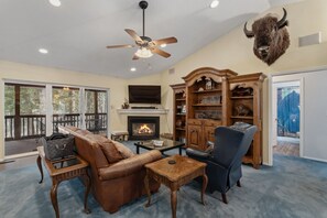 Smart TV, fireplace, table football, books