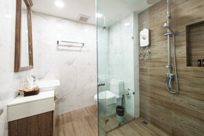 Comfort Suite, 2 Bedrooms, Balcony, City View | Bathroom | Shower, hair dryer, bathrobes, slippers