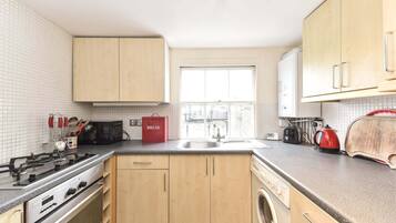 Family Apartment, City View | Private kitchen | Coffee/tea maker, electric kettle, toaster