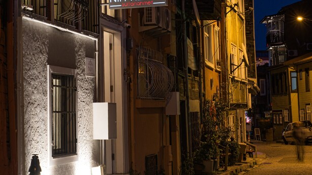 A hotel with a sign reading "NIA HOTEL" and a staircase leading to the entrance. - NİA SULTANAHMET HOTEL (Istanbul)