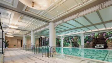 Indoor pool, open 6:00 AM to 10:00 PM, pool loungers, lifeguards on site
