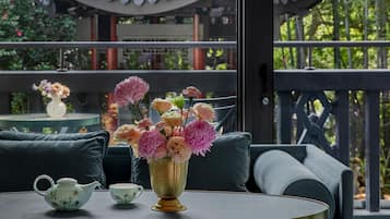 Premier Room, Garden View | Living area | LCD TV, iPad