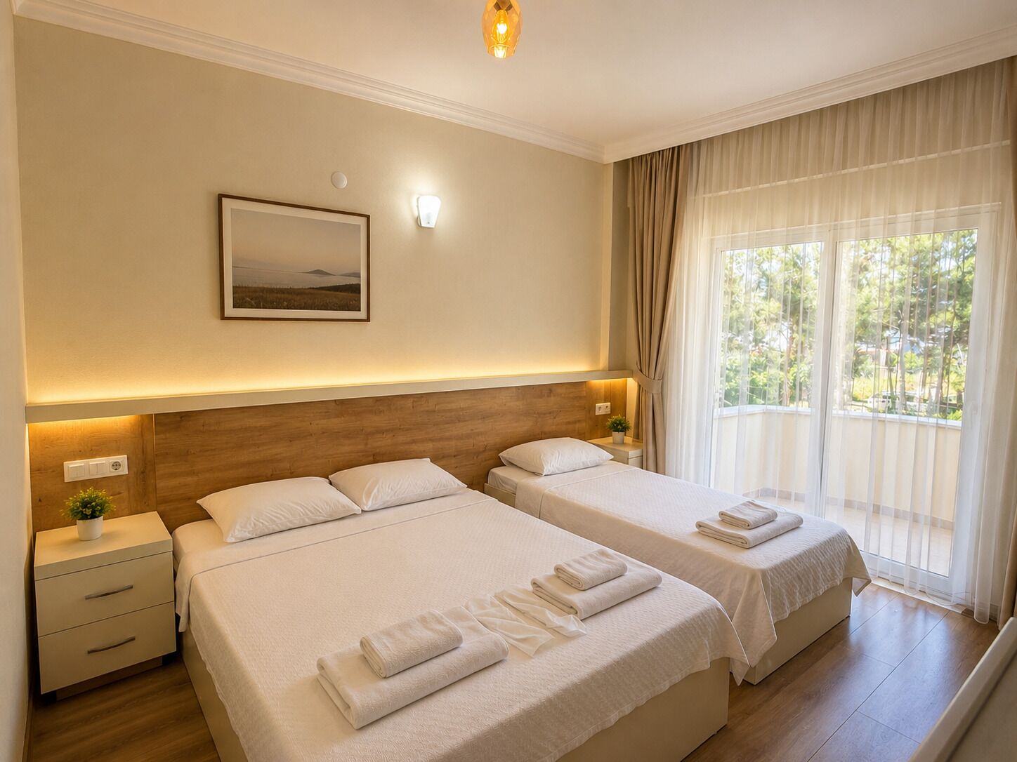 Family Triple Room, Balcony, Garden View | Premium bedding, laptop workspace, free WiFi, bed sheets