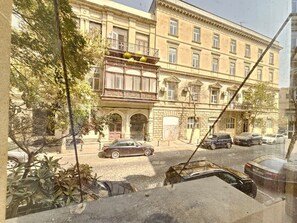 Standaard driepersoonskamer, uitzicht op stad | Uitzicht op de stad