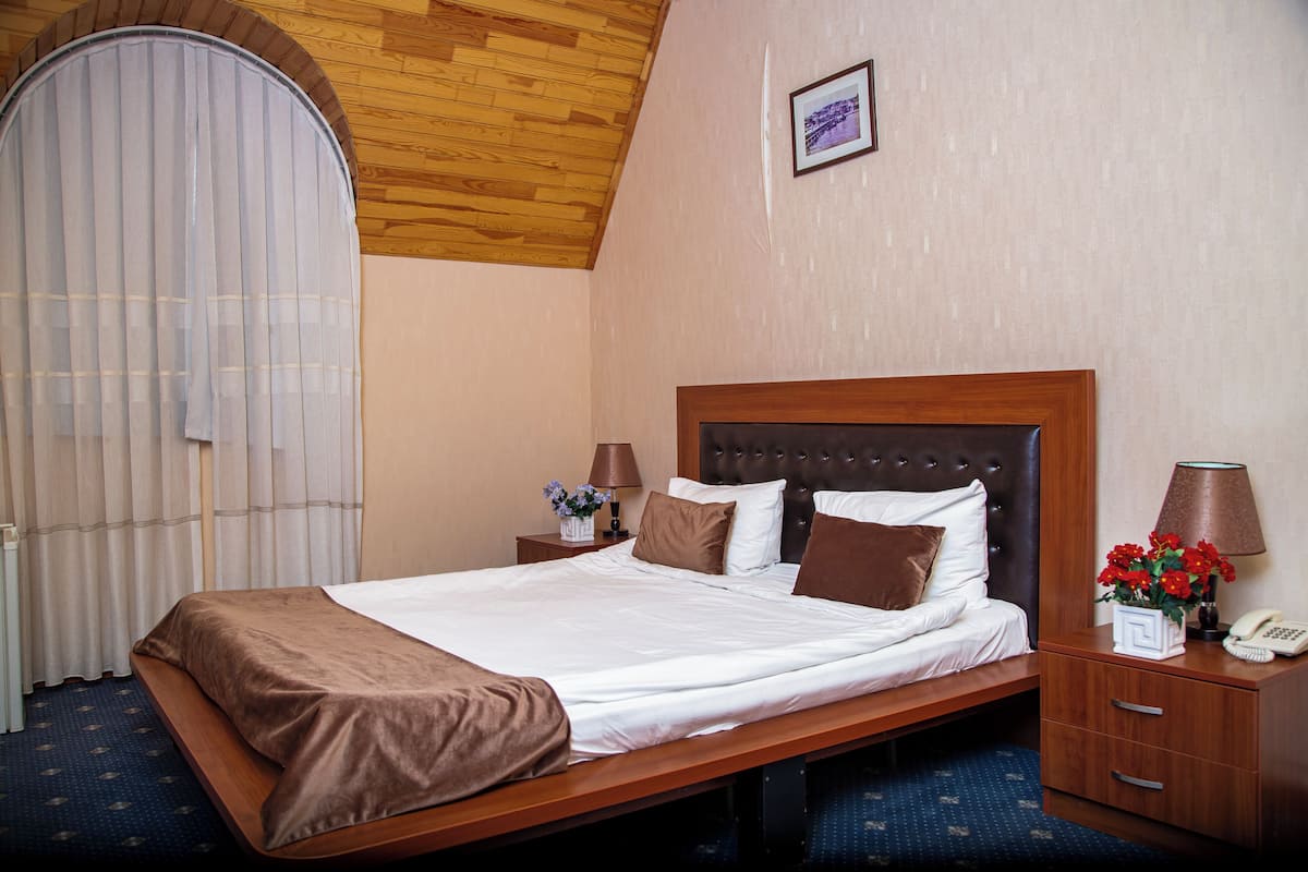 Economy Double Room | Premium bedding, desk, blackout drapes, iron/ironing board (on request)