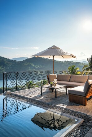 Outdoor pool, pool umbrellas, sun loungers