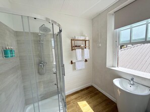 Standard Room, 1 Queen Bed | Bathroom | Shower, hair dryer, towels, soap - Eden On The Sea (Bridgetown)