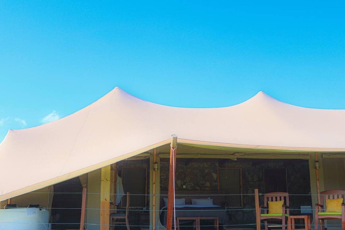 Deluxe Tent | Premium bedding, memory foam beds, in-room safe, desk