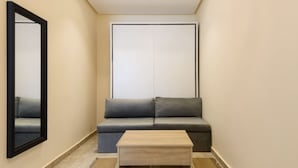 Interior - Smart Compact Studio with Convertible Queen Bed , Sofa and Kitchenette and shared community garden (Golden Gates , Mokkatm)